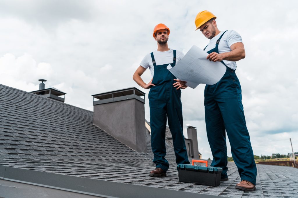 professional roofers talking about roofs