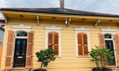 Historic New Orleans home with an old shingle roof that may contain asbestos