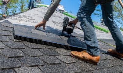 Roofing contractor installing a wind-resistant FORTIFIED roof on a Louisiana home