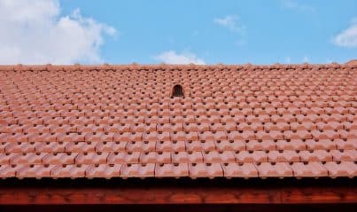 Ridge vent running along the peak of a New Orleans asphalt shingle roof