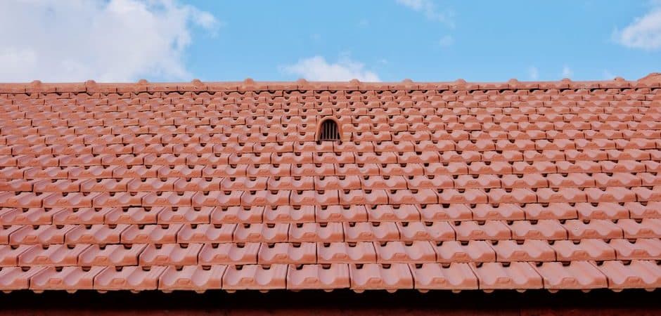 Ridge vent running along the peak of a New Orleans asphalt shingle roof