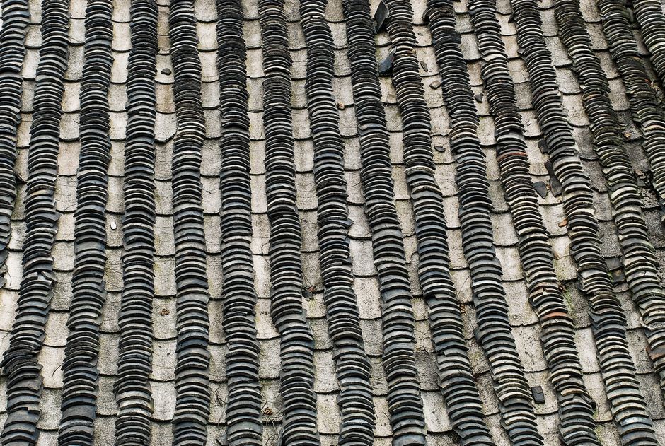 Close-up of natural slate tiles showing color and thickness variation